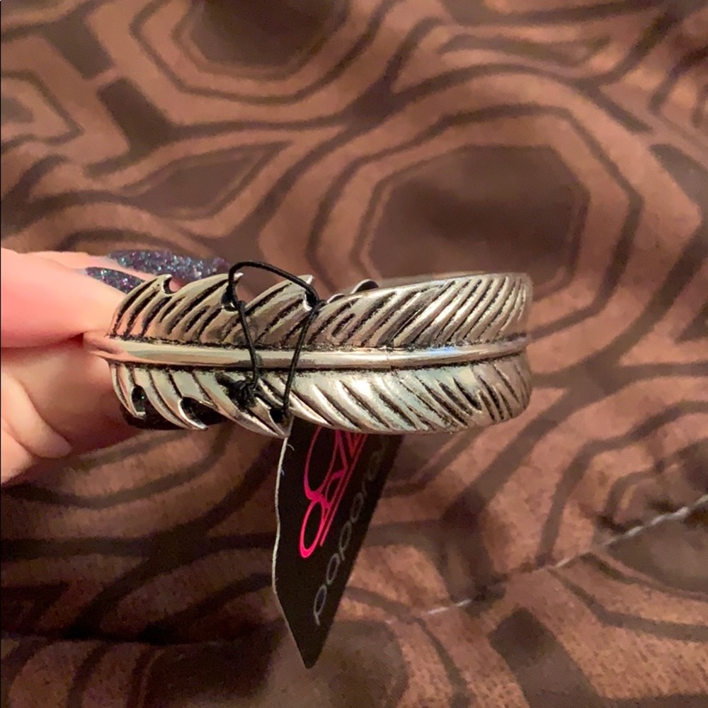 Beautiful feather cuff bracelet